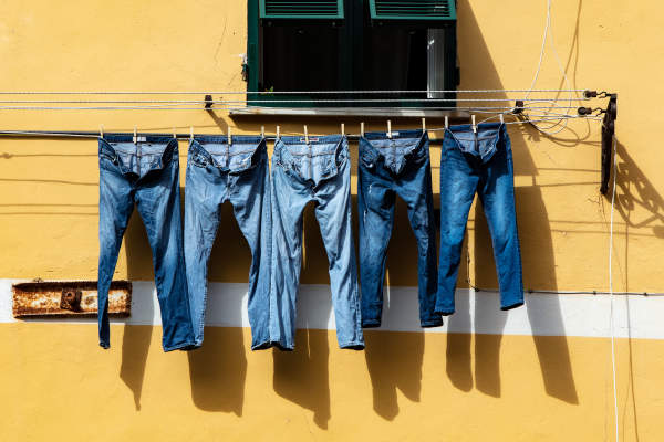jeans hanging on line