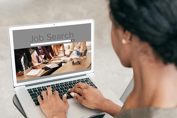 Woman looking for a job online.