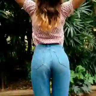Woman in botanical garden from behind