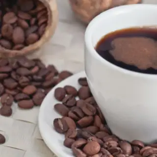 cup of coffee and coffee beans image