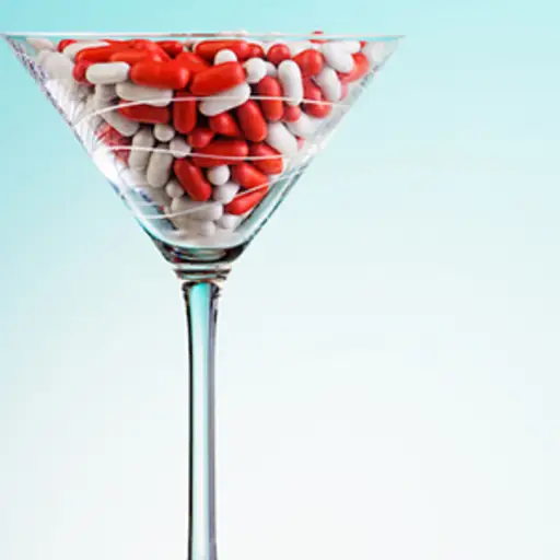Pills in a glass