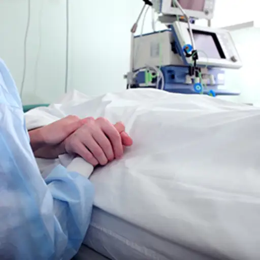Holding hand of patient in the hospital