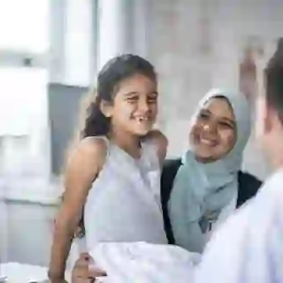 young girl and mother with doctor