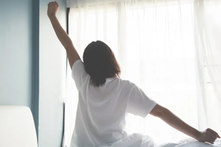Stretching after long sleep.