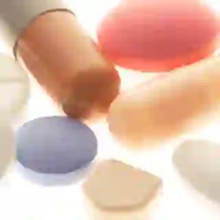 Various pills on white background. 