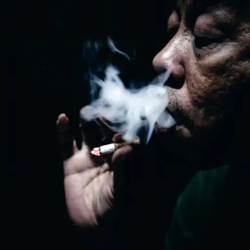 senior man smoking cigarette