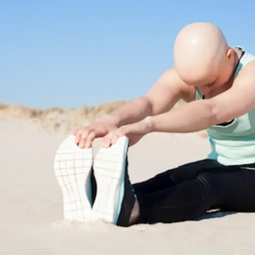 Stretching before working out after chemo.