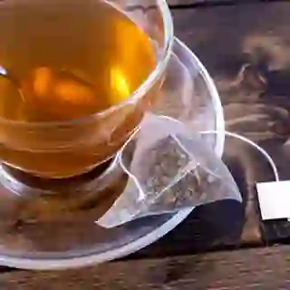 Green tea in glass teacup