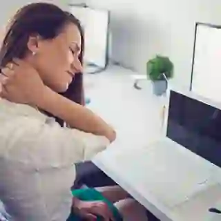 woman with neck pain image