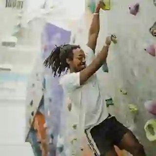 Man climbing a rock wall.