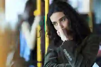 Nervous woman on a bus.