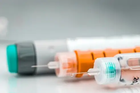 insulin syringe and vial