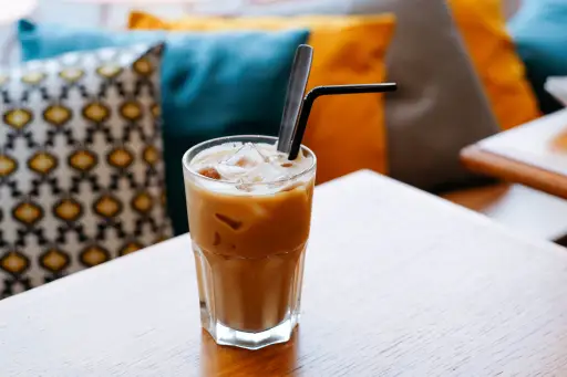 Iced latte with straw