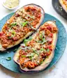 Moroccan Quinoa-Stuffed Eggplant With Pine-Nut Parmesan