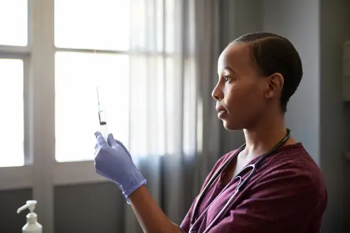 Nurse preparing a vaccine.