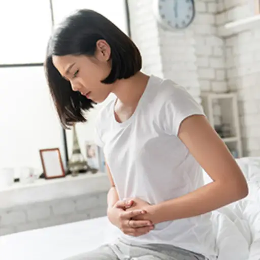 Woman with stomach pain.
