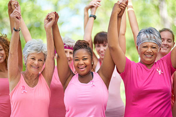 Breast cancer survivors wearing pink.
