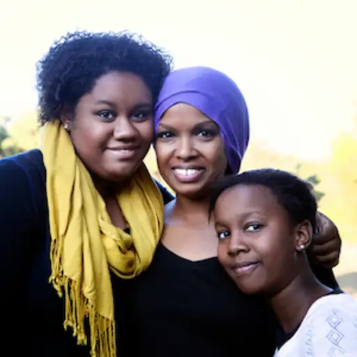 患癌症的母亲和她的两个女儿。
