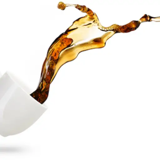 咖啡杯,里面的咖啡被扔出来。
