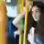 Distressed woman on a bus.