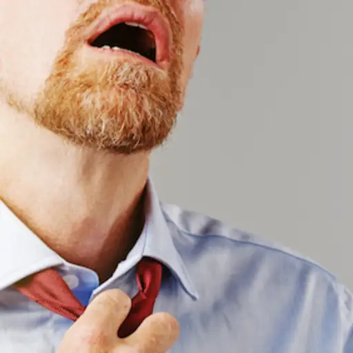 Office man out of breath loosening tie.
