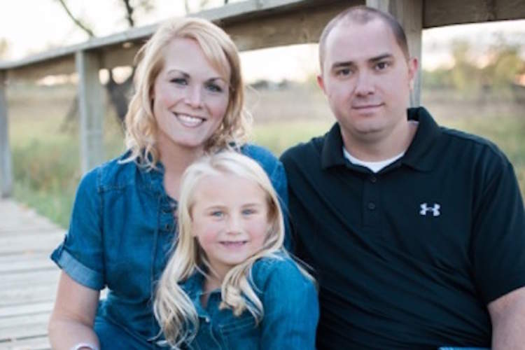 希瑟Huus与丈夫肖恩,和女儿,佩奇。