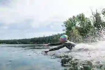 A woman swims in a lake
