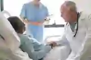 A woman talks to her doctor