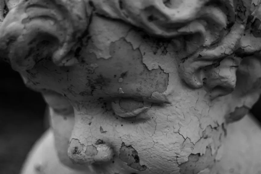 close up of peeling statue