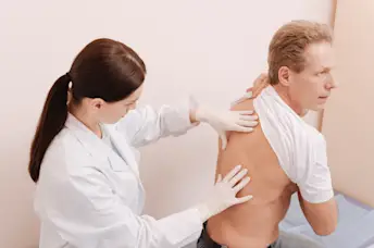 doctor checking back