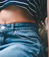 Woman's stomach exposed