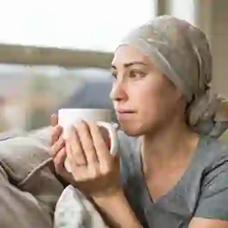 woman with cancer drinking tea image