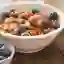 A view of blueberries and nuts in a bowl