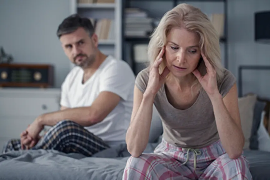 Unhappy middle age couple.