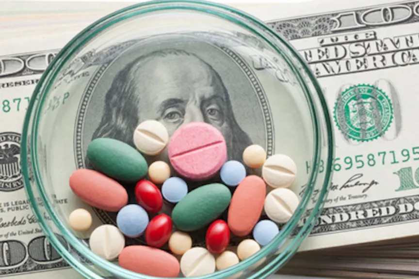 Pills obscure Benjamin Franklin on the $100 bill.