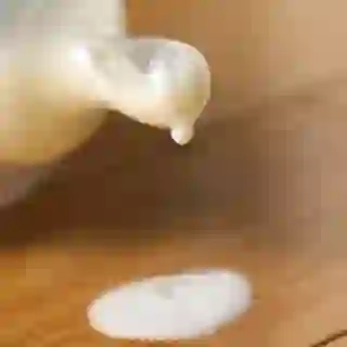 milk leaking out of baby bottle