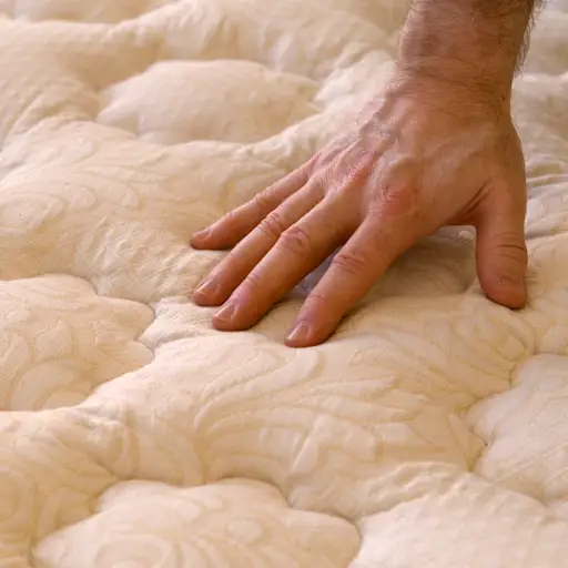 Buying bed mattress, checking firmness.