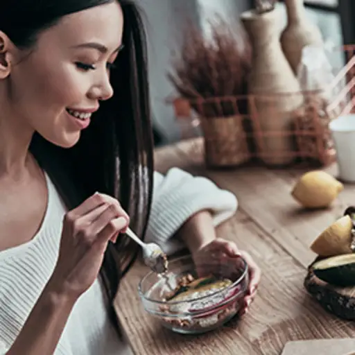 Woman eating a healthy meal.