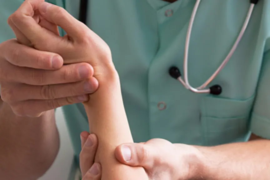 Dermatologist testing a patient's skin.