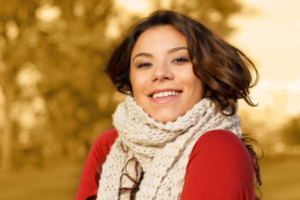 Woman in scarf smiling