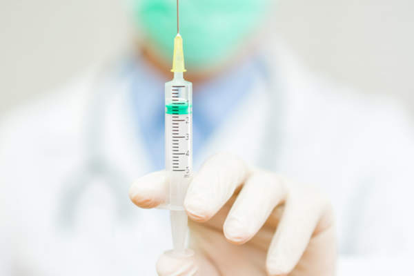 刮刀保持激素疗法注射注射器肺癌。