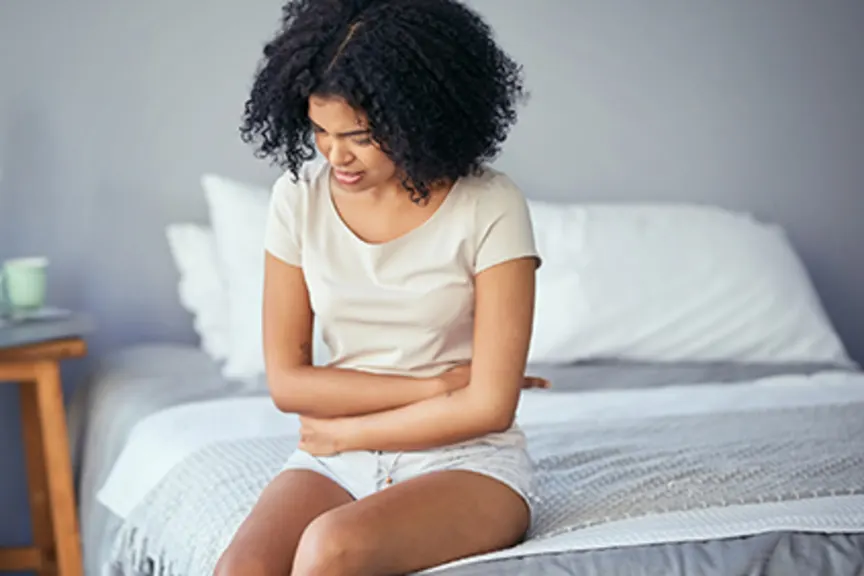 Woman suffering from menstrual cramps.