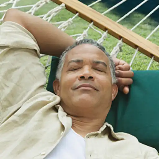 Senior man sleeping in hammock.