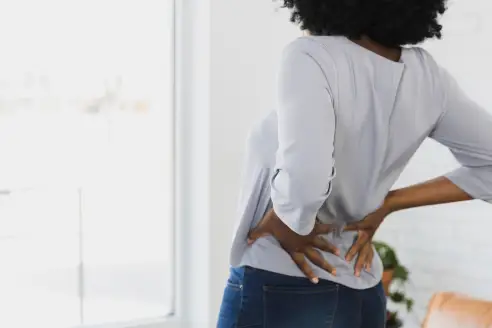 Relieve Stomach & Back Pain: Effective Solutions & Tips