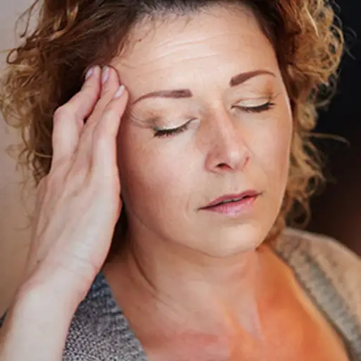 Woman with a migraine.