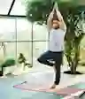 A man practices yoga