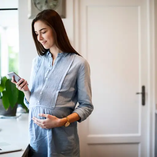 Pregnant woman on phone