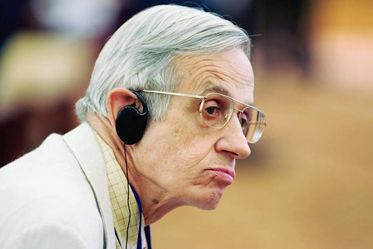 Nobel prize laureate John Forbes Nash of USA listens during a colloquium featuring entrepreneurship and corporate growth at the Nobel Laureates Beijing Forum 2005.