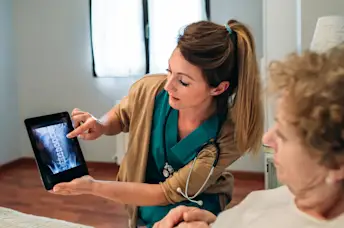nurse showing bone scan
