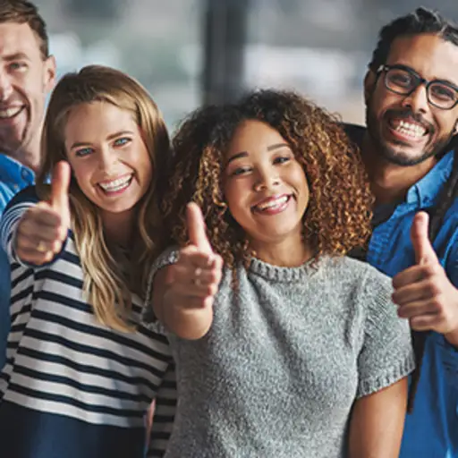 Group of people giving a thumbs up